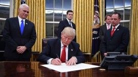 President Trump signs coronavirus stimulus aid relief package bill passed by Congress